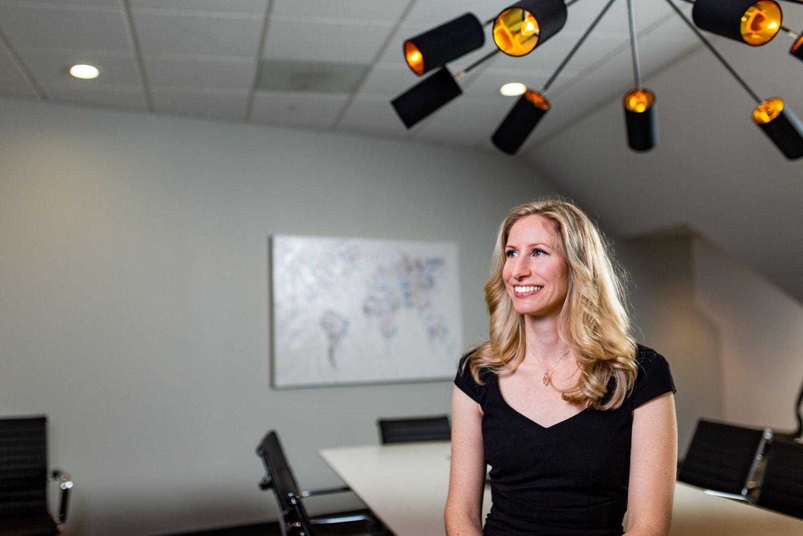 Sadie Rosethorn, founder and principal consultant of Sadie Rosethorn Consulting, standing in a professional training environment.